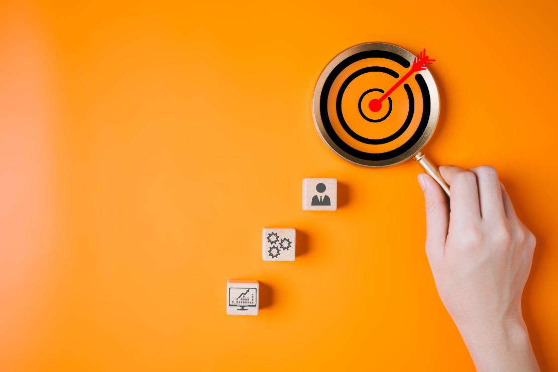 magnifying-glass-with-business-target-goal-icons-f-2024-10-11-01-43-33-utc
